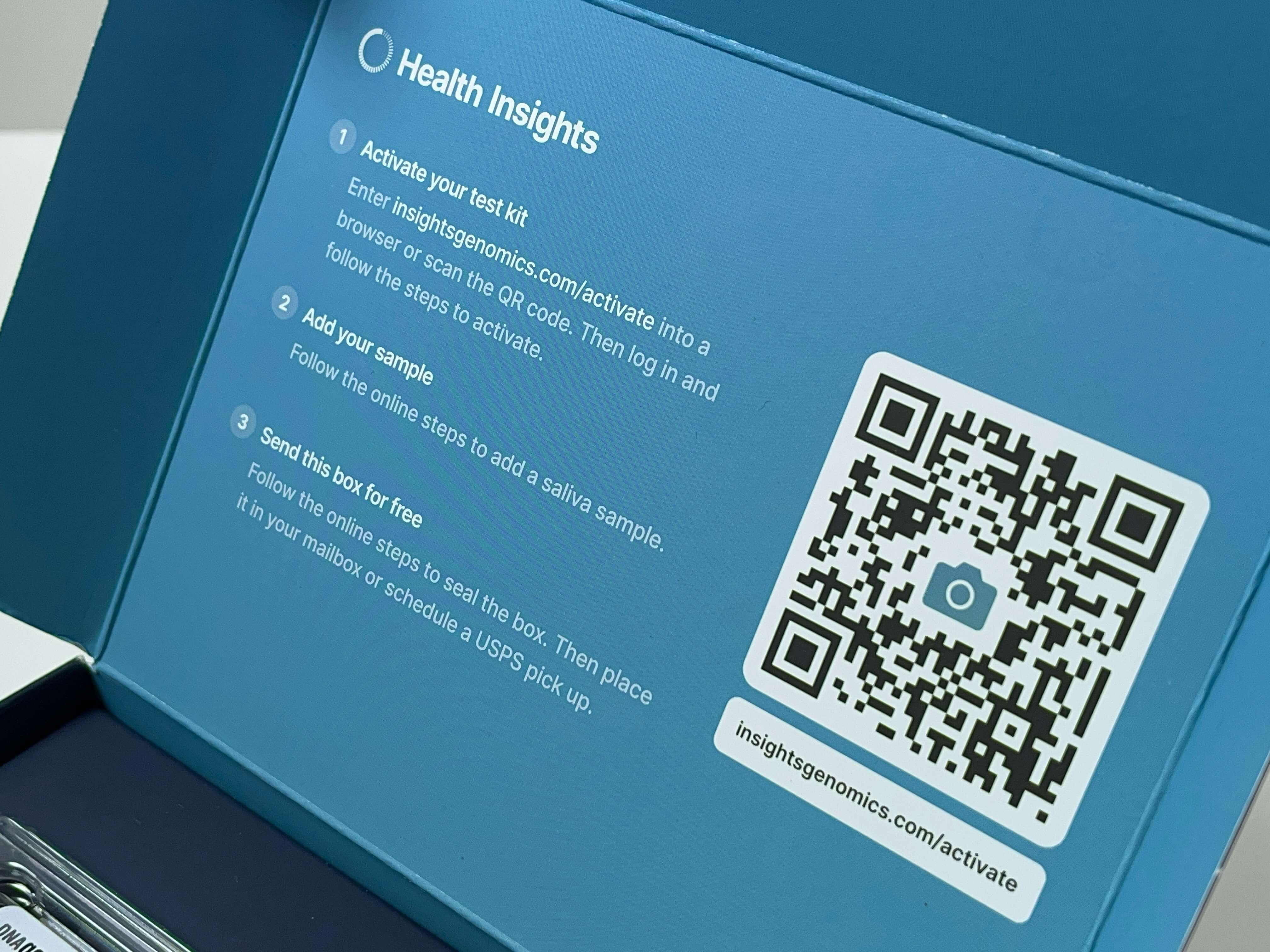 The inside panel of a test kit showing instructions for use and a QR code to start.